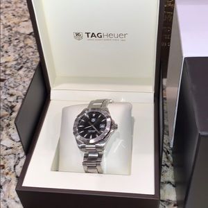 TAGHeuer Black dial face watch